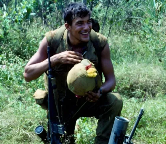 Jack McLean eating fruit during Vietnam War